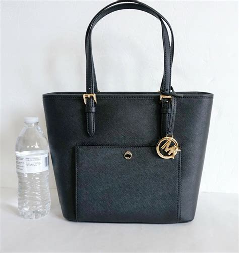 michael kors jet set medium top zip snap pocket tote|Michael Kors Tote bag.